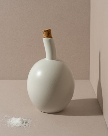 handmade, artisan made, olive oil bottle, olive oil, containers, olive oil dispenser, vinegar dispenser, matte white, matte finish, serveware, drinkware, bouteille d'huile d'olive, bouteille, contenant pour huile et syrop d'érable, blanc mat, artisan made, fait à la main, arisanal,  intemporel, design, zitouna, gharyan stoneware, ethically made, ethique, fair trade, commerce équitable